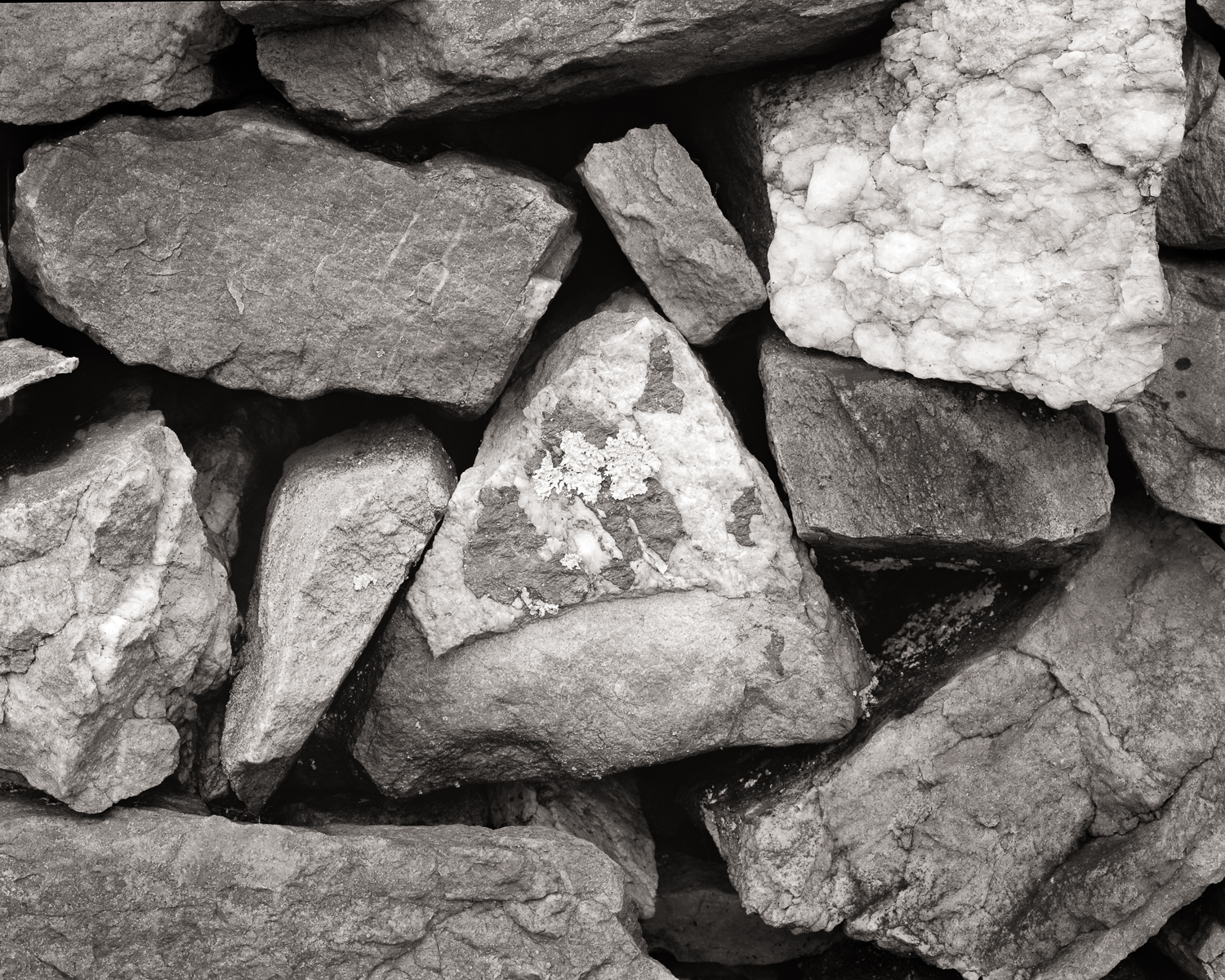 abstract photograph of a stone fence as example of context matters